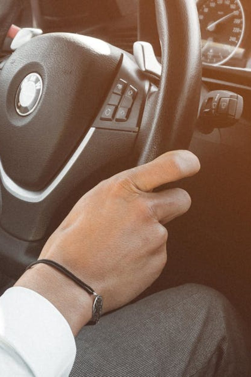 Close-up of a luxury car's interior while driving in Marrakech, Morocco.
